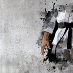 Martial arts master on wall background. Sports banner. Horizontal copy space background